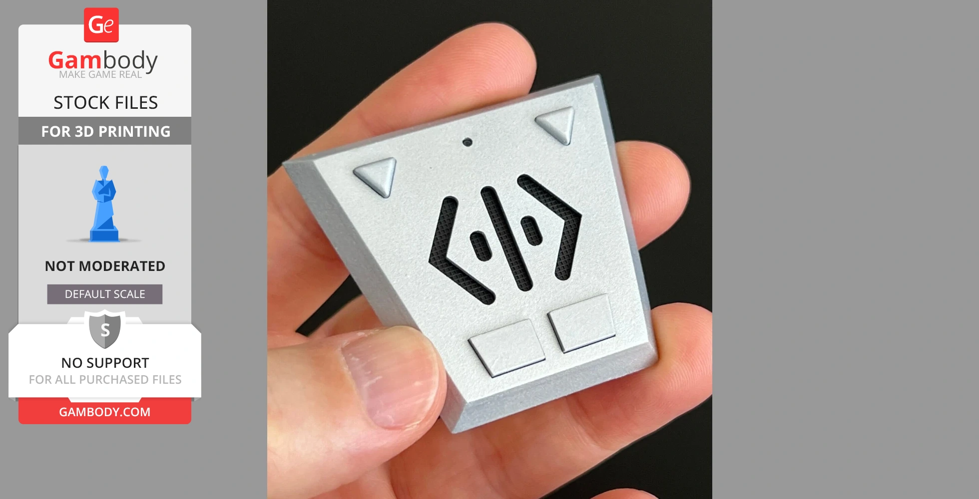 A hand holding a triangular gray Comm-link prop with buttons, designed for 3D printing from Gambody.
