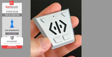 A hand holding a triangular gray Comm-link prop with buttons, designed for 3D printing from Gambody.