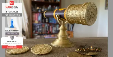 Elaborate golden pirate-themed scroll holder with detailed engravings, displayed with gold coins.