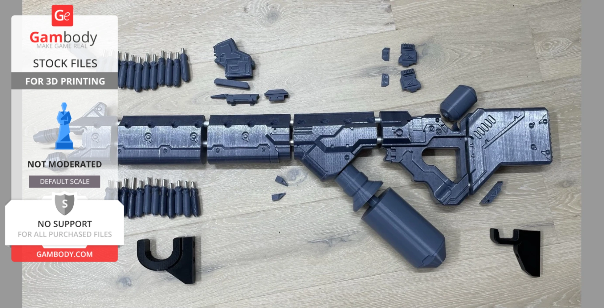 A 3D-printed District 9 AR replica in parts, ready for assembly, displayed on a wooden surface.