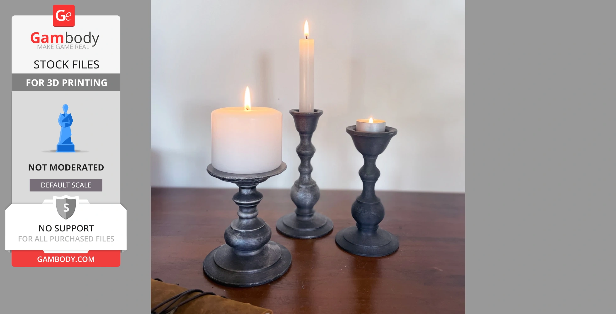 Three 3D-printed gray candle holders with lit candles, varying in height and design, on a wooden surface.
