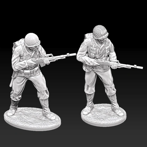 Two WWII US Rangers, wearing helmets and gear, standing with BAR rifles in action poses.