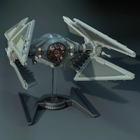 A detailed 3D model of a TIE Avenger starfighter on a display stand.