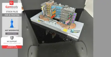 Miniature Hong Kong street scene with colorful buildings and signage, featuring a tram and vehicles.