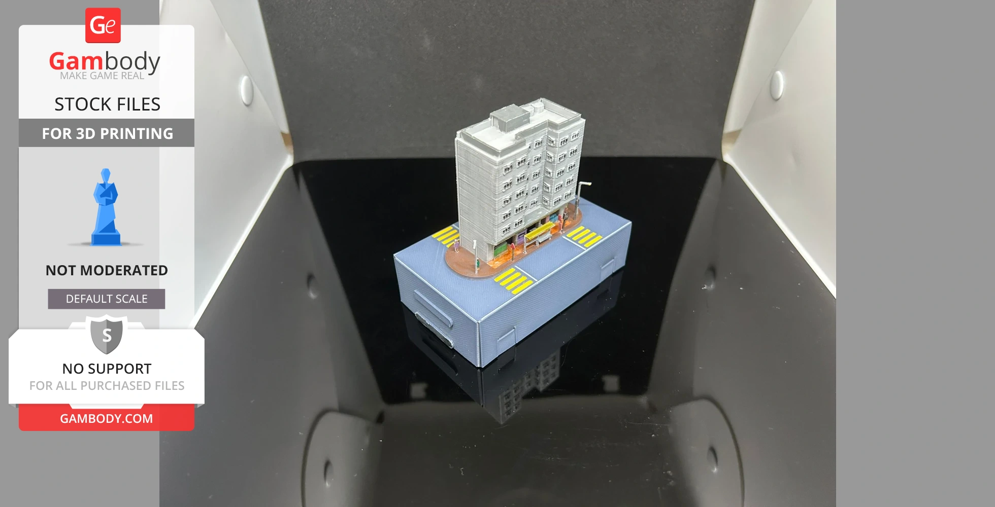 Miniature 3D-printed Hong Kong building with street details on a display base.