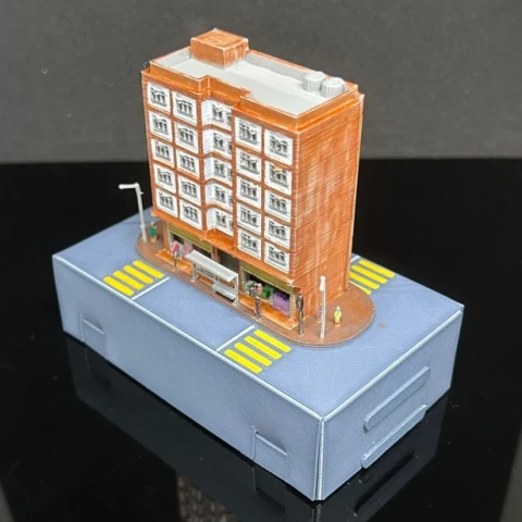 Miniature model of a Hong Kong-style urban building on a street base, ready for 3D printing.