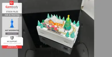Miniature Christmas train set with decorated tree, snowy village, and colorful train on a circular track.
