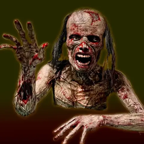 A detailed, life-size zombie model with an open mouth and outstretched hand, 1:1 scale for 3D printing.