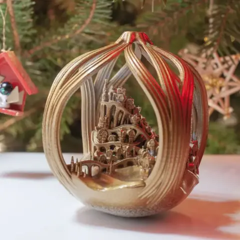 Ornate 3D-printed sculpture of Whoville enclosed within a decorative, flowing pendant design.