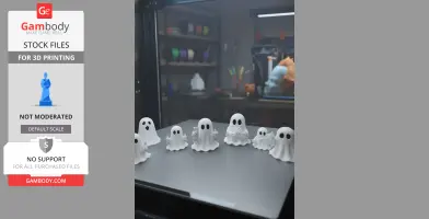 Cute 3D-printed ghost figurines with playful poses on a 3D printer tray.