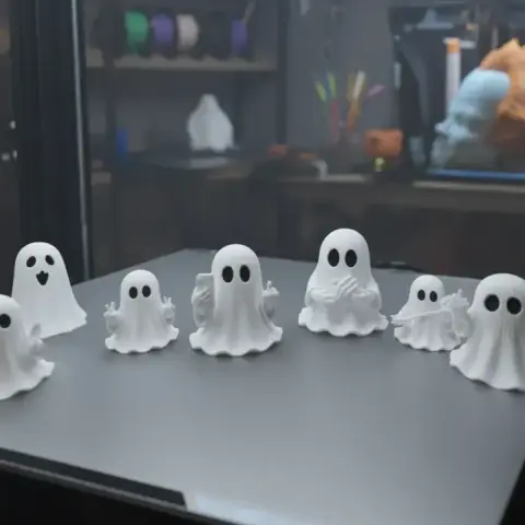 Ghost figure in a gaming chair, surrounded by a dual monitor setup and speakers, with ambient purple lighting.