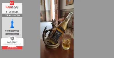 A dragon-shaped wine caddy holds a bottle, with a drink in a glass nearby.