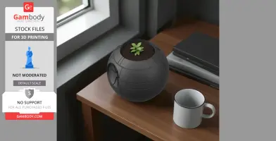 Star Wars Death Star-shaped plant pot with sprout, placed on a wooden table near a white mug and books.