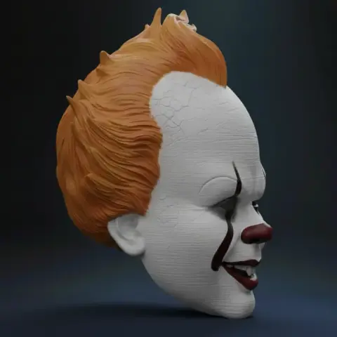 3D model of a Pennywise mask with orange hair and cracked white face, designed for 3D printing.