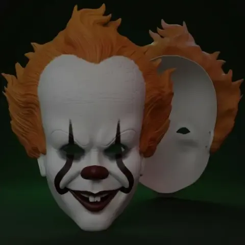 3D model of a Pennywise mask with orange hair and cracked white face, designed for 3D printing.