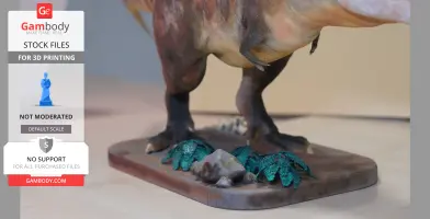 Close-up of a 3D printed T. rex model's legs on a base with foliage and rocks.