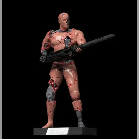 Damaged humanoid robot figure holding a large weapon, exposed mechanical parts, on a display stand.