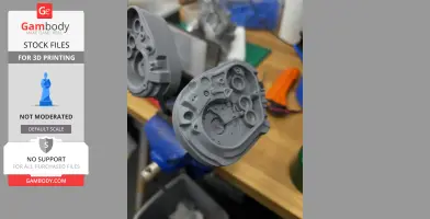 Close-up of 3D printed T-800 skull parts on a workshop table.