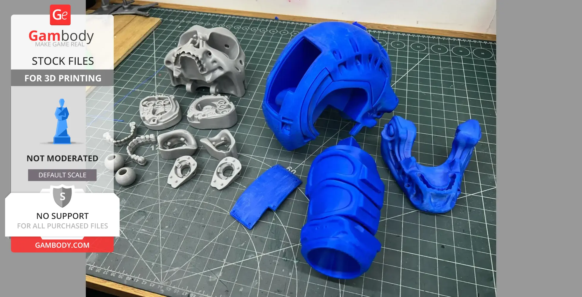 3D printed parts of a T-800 Terminator skull, in gray and blue, laid out on a cutting mat.
