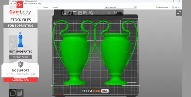 Two 3D models of iconic football trophies with engraved details, shown in green.