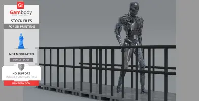 A silver robotic skeleton standing behind a black railing on a gray platform.