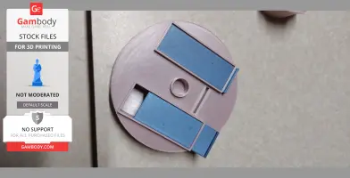 Round pink surface with blue sliding compartments, intended for jewelry storage.