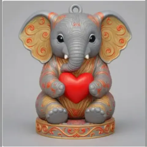 A cute elephant figurine holding a red heart, with ornate ears and a decorative base.