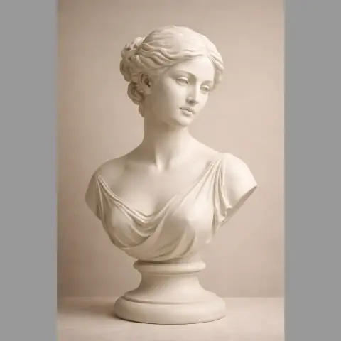 Elegant female bust sculpture with draped clothing, mounted on a pedestal.