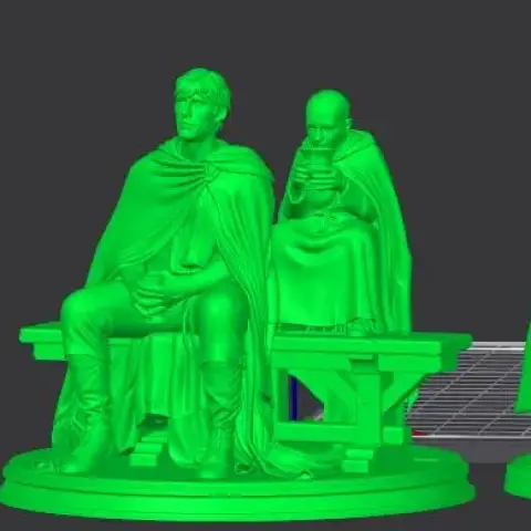 A knight and child figure stand on a base, with the knight holding a sword, wearing medieval attire.