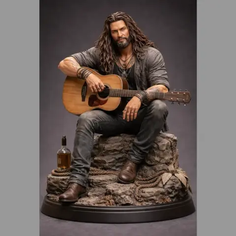 A 3D model of a man with long hair playing guitar on rocks, with a bottle nearby.