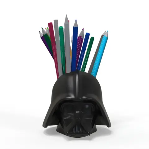 A black helmet-shaped pencil holder with colorful pencils inside, inspired by a sci-fi design.