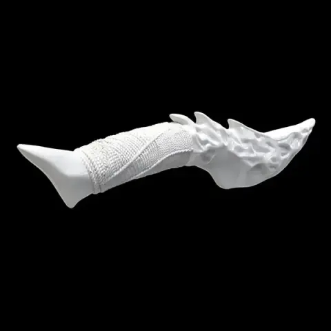 Curved fantasy knife with tribal details and textured handle, designed for 3D printing.