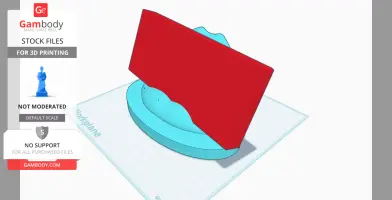 A 3D-printed phone stand shaped like an open mouth, featuring a red phone placeholder.