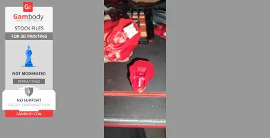 Two red 3D printed parts resembling a Clicker model component, with visible connector pieces.