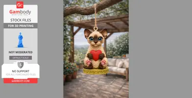A cute Sphynx cat ornament holding a heart pendant, hanging on a branch in a garden setting.