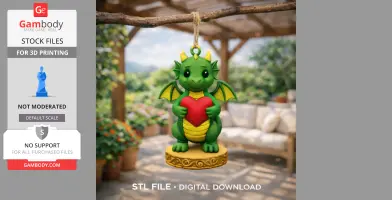Cute green dragon figurine holding a red heart, hanging from a twig, set in a garden patio.