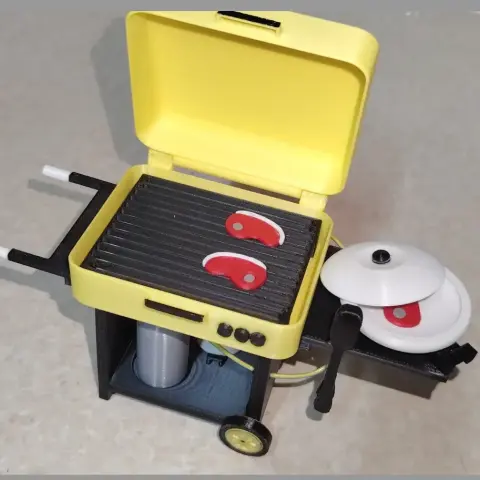Miniature BBQ with tools and steak. display use and battery holder