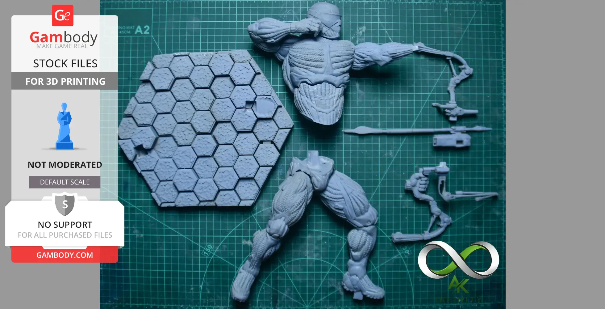 Disassembled Crysis nanosuit model for 3D printing on a green cutting mat.