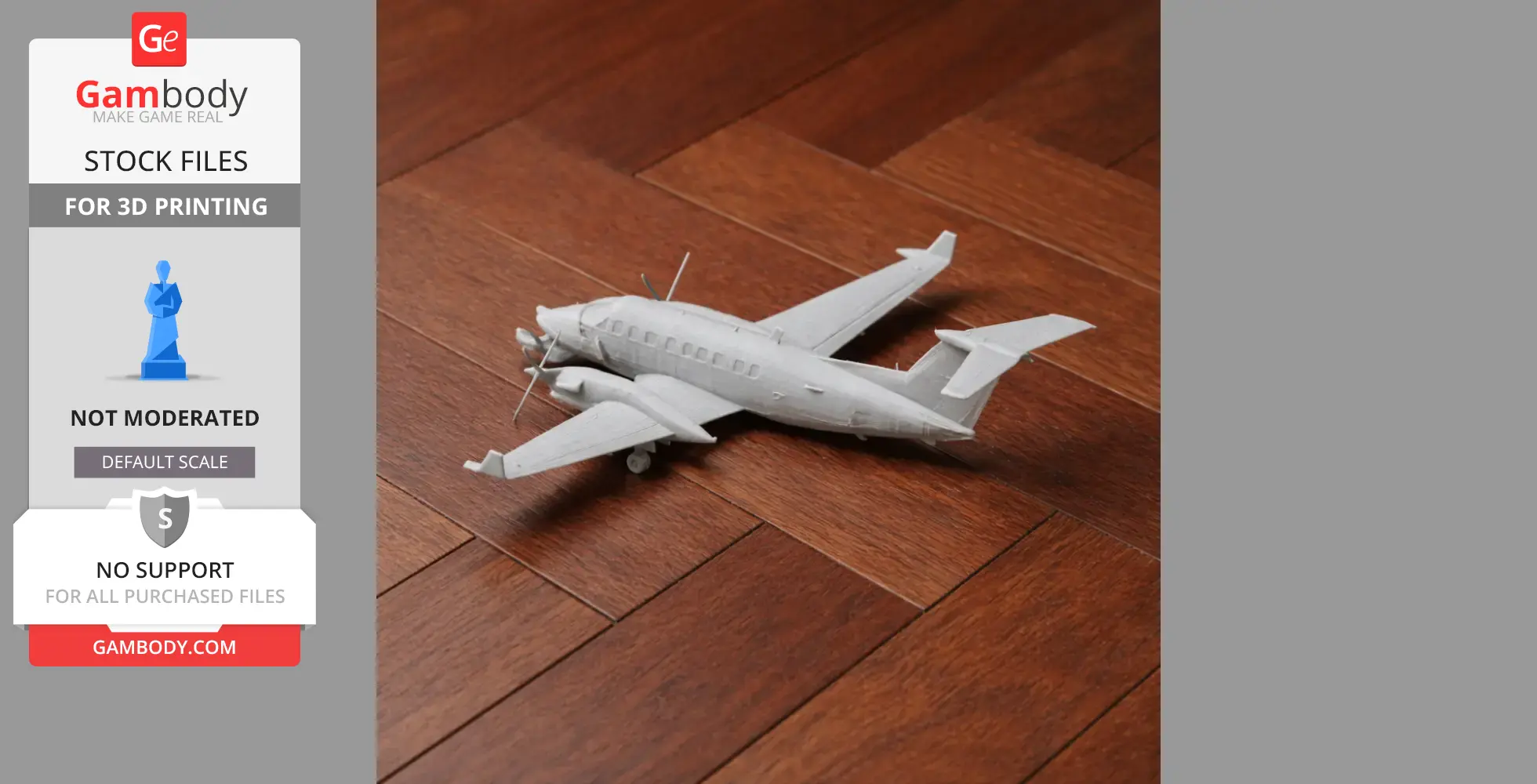 Miniature 3D-printed Beechcraft King Air plane model on wooden floor.
