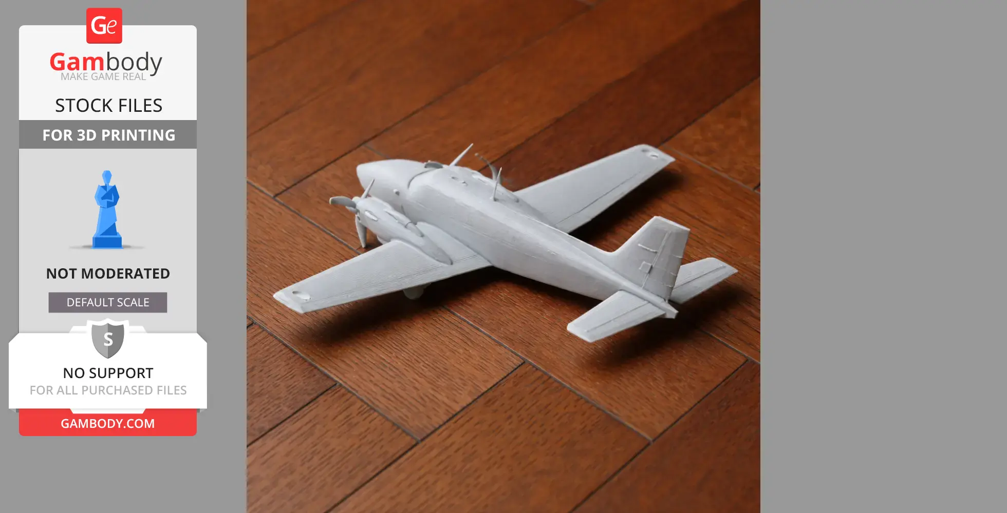 3D printed Beechcraft Baron plane model on wooden floor.