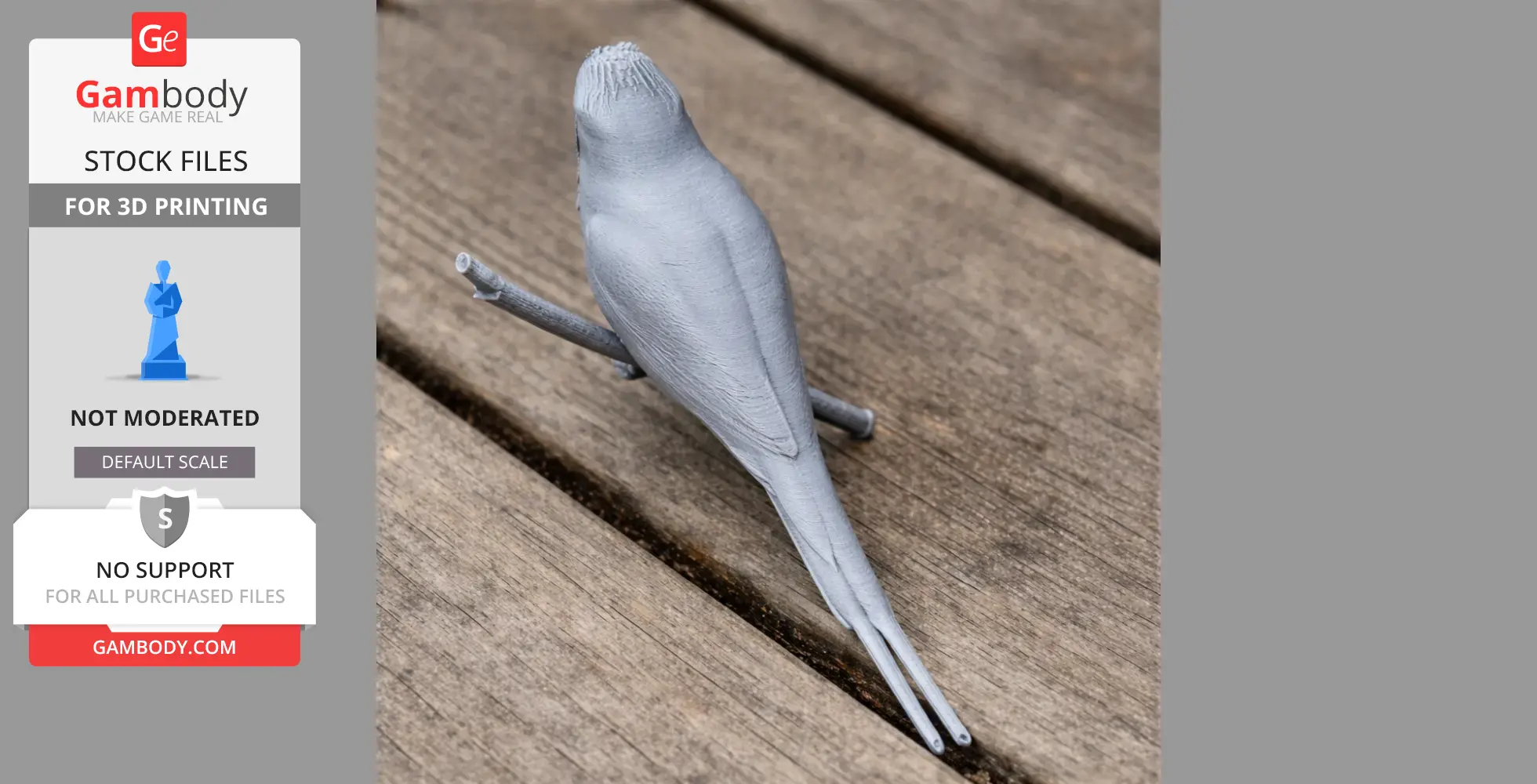 Gray 3D printed bird model perched on a branch, displayed on a wooden surface.