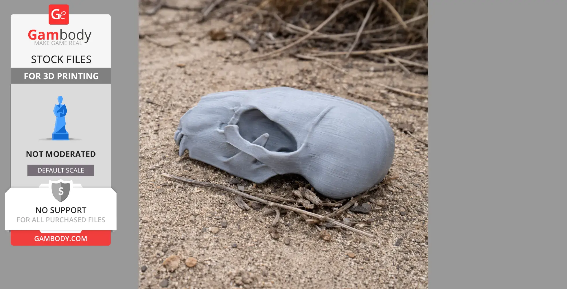 3D printed black bear skull model resting on sandy ground with twigs.