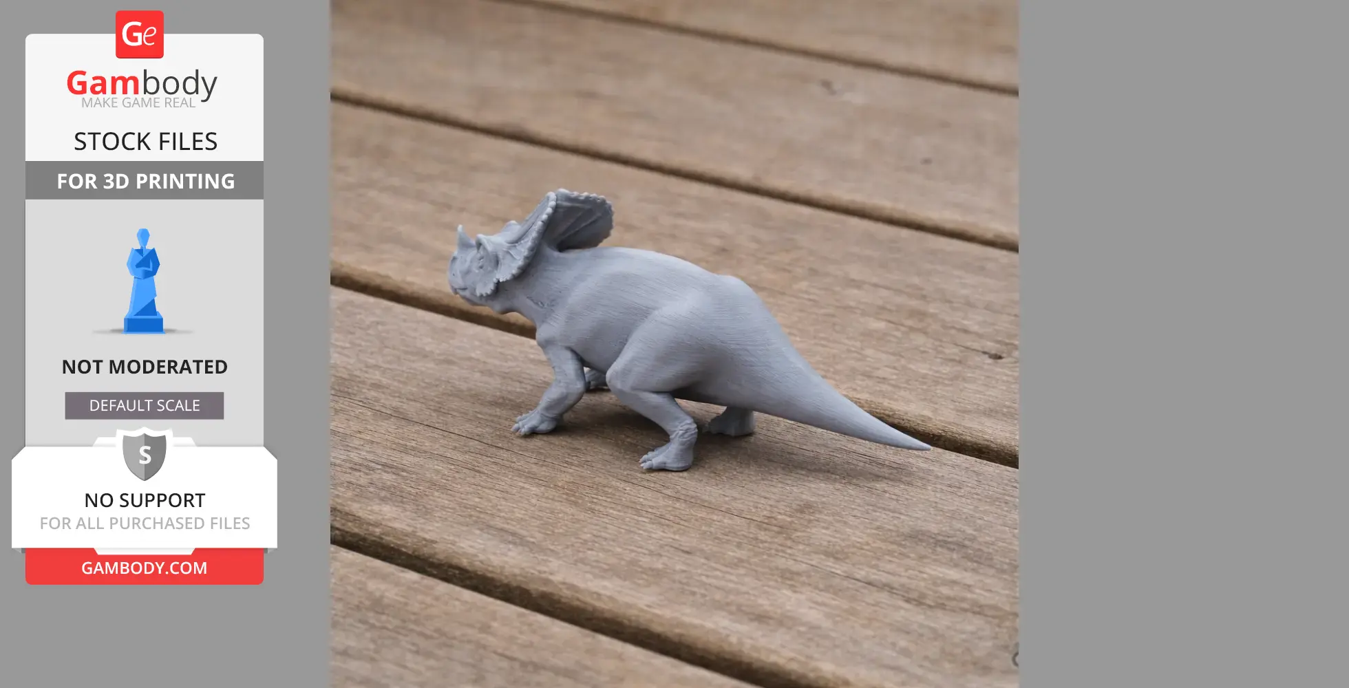 Gray 3D-printed dinosaur model, resembling a ceratopsian, on a wooden surface.