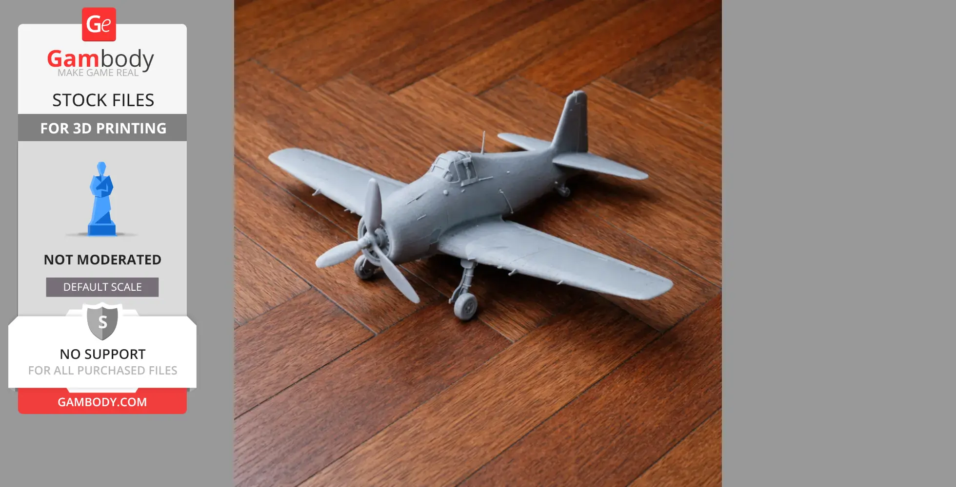 Gray 3D printed model of an F6F Hellcat plane on a wooden surface.