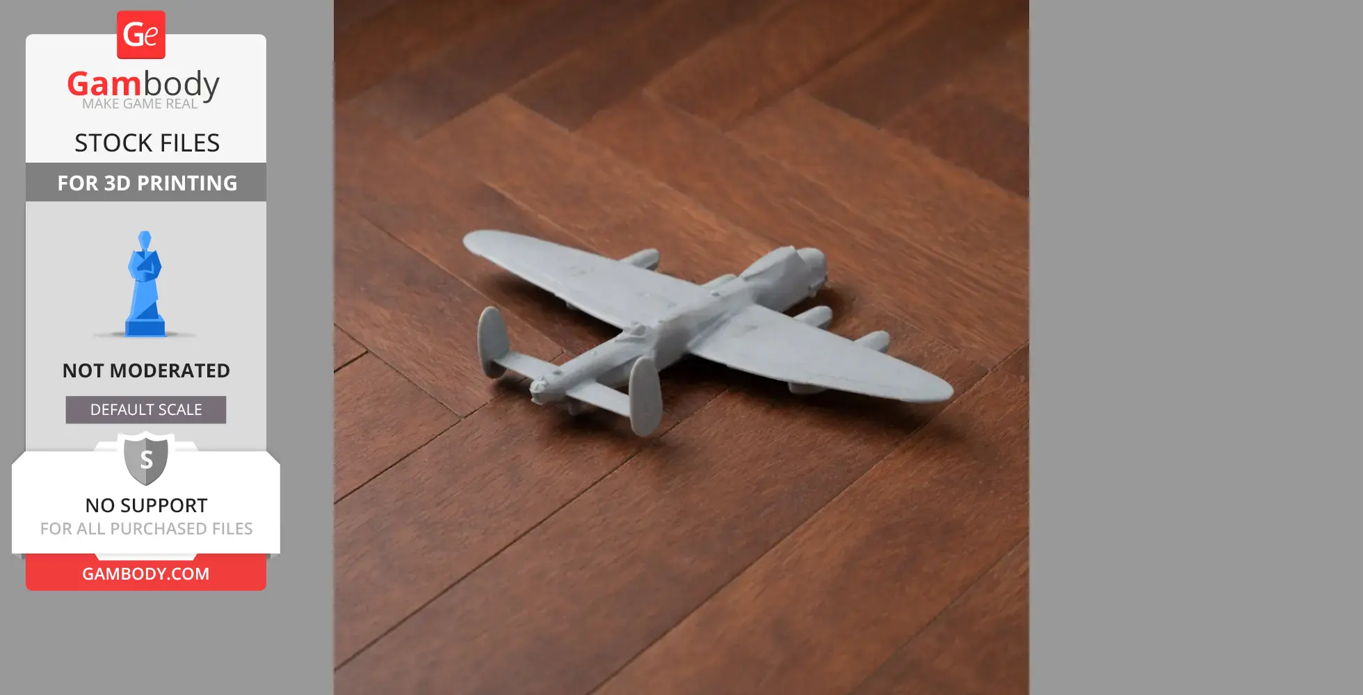 Gray 3D-printed model of a Lancaster Bomber plane on a wooden surface.