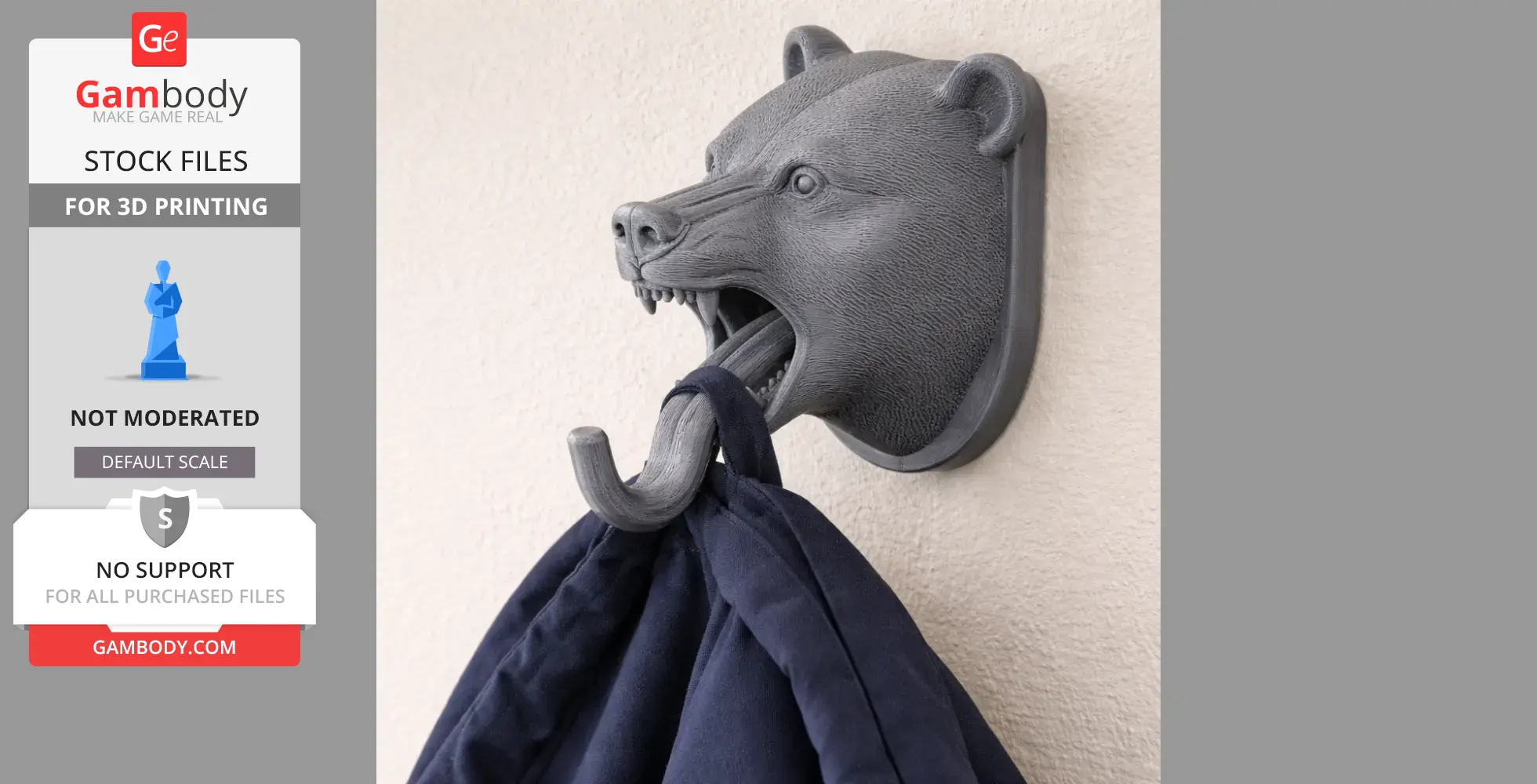 A 3D-printed black bear head with an open mouth, serving as a wall hook holding a dark garment.