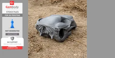 A detailed 3D printed black wallaroo skull resting on textured ground.