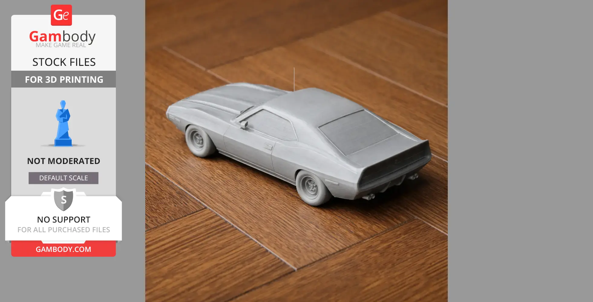 A gray 3D-printed scale model of a classic car on a wooden floor.
