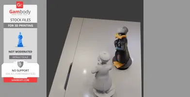 Daffy Duck in mobster outfit, holding a cigar. Two 3D printed figures, one colored, one gray.