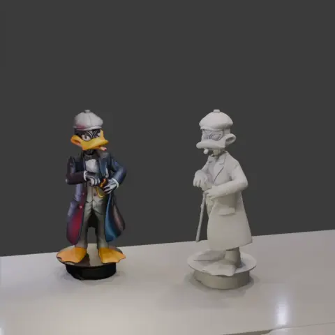 Daffy Duck as a mobster, in a detailed coat and hat, holding a cane; one colored, one grayscale 3D model.